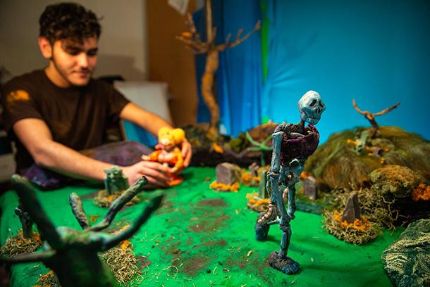 student works on a stop motion animation project