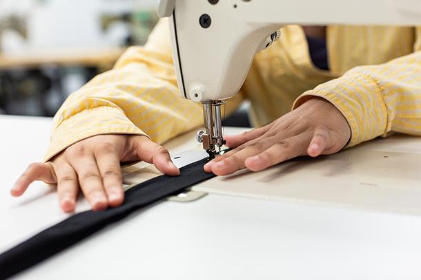 student using a sewing machine