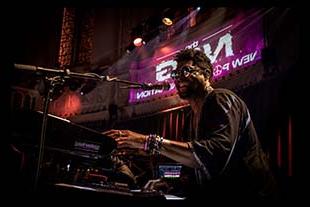 Morris Hayes performing in concert at the keyboards.